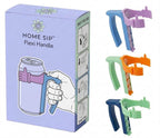 A product box labeled 'HOME SIP Flexi Handle' shown beside three small views of the product itself: a blue handle with a purple grip, an orange handle with a green grip, and a dark blue handle with a green grip. The box includes a hand illustration demonstrating use.